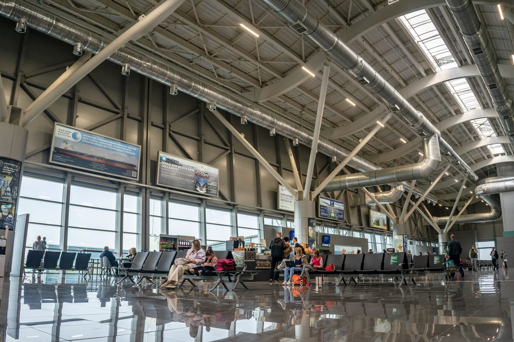Modern airport terminal passengers for Gunnison airport shuttle reservations